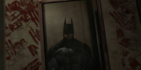 Batman looking into a mirror in Batman: Arkham VR