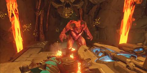 Doom 2016 multiplayer player jumping towards demon