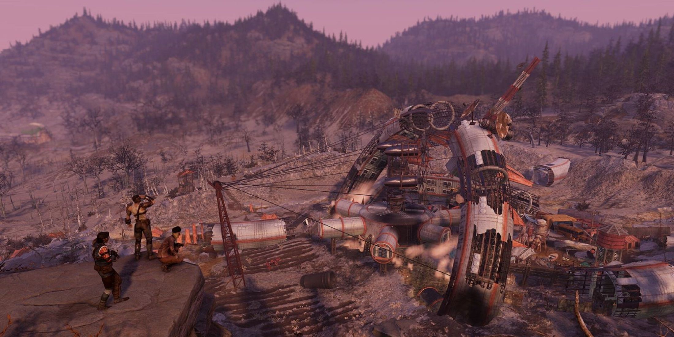 Group surveying a destroyed spaceship in the wasteland in Fallout 76 