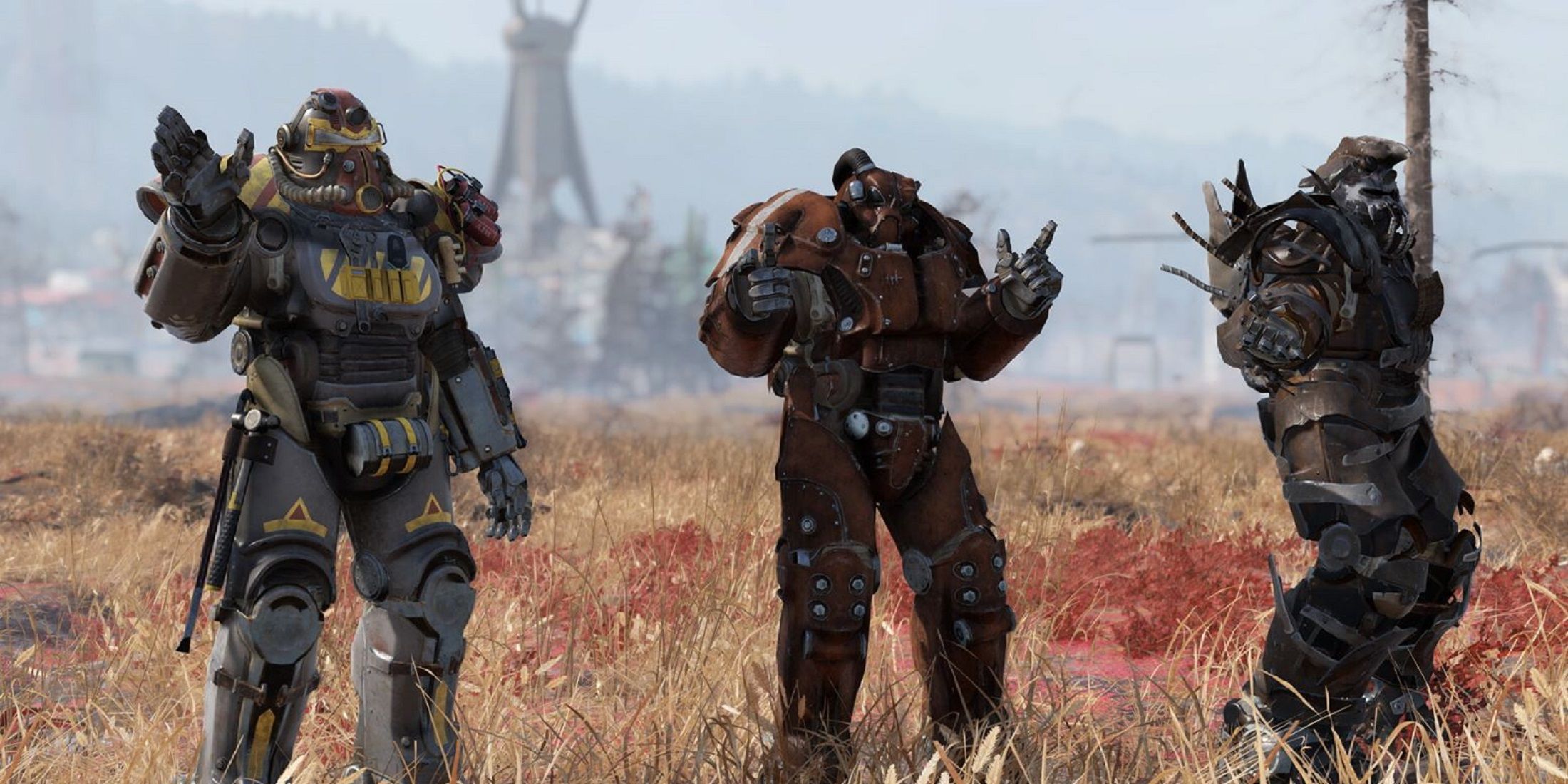 Fallout 76 Three armored characters standing in a field.