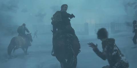 abby on the back of a horse firing at zombies