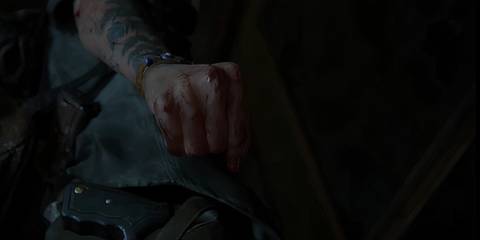 ellie clenching her fist
