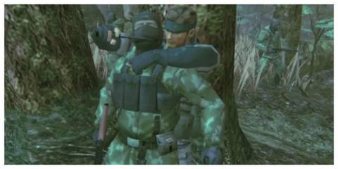 METAL GEAR SOLID 3: Snake Eater - IGDB Screenshot (Holding A Guard)