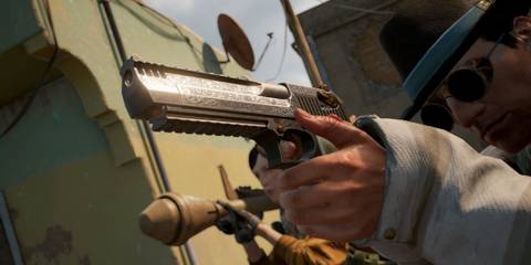Close-up of a detailed handgun in PUBG character’s hand.
