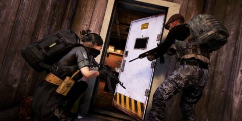 Two PUBG Characters breaching a door with weapons drawn