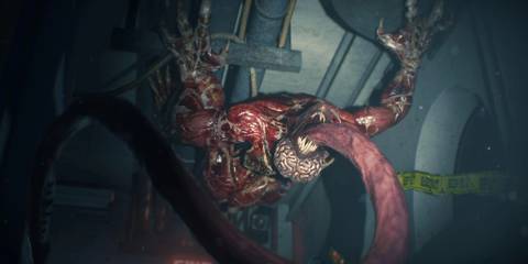 A Licker on the ceiling attacking with its tongue in Resident Evil 2