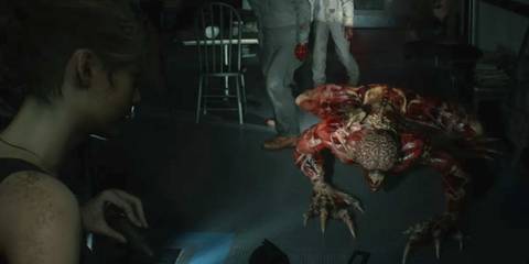A Licker about to attack Claire Redfield in Resident Evil 2