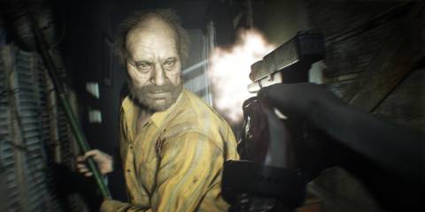 Resident Evil 7 Jack Baker attacking Ethan Winters with a pipe