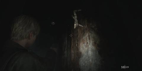 Shooting at a Spider Mannequin in Silent Hill 2 (2024)