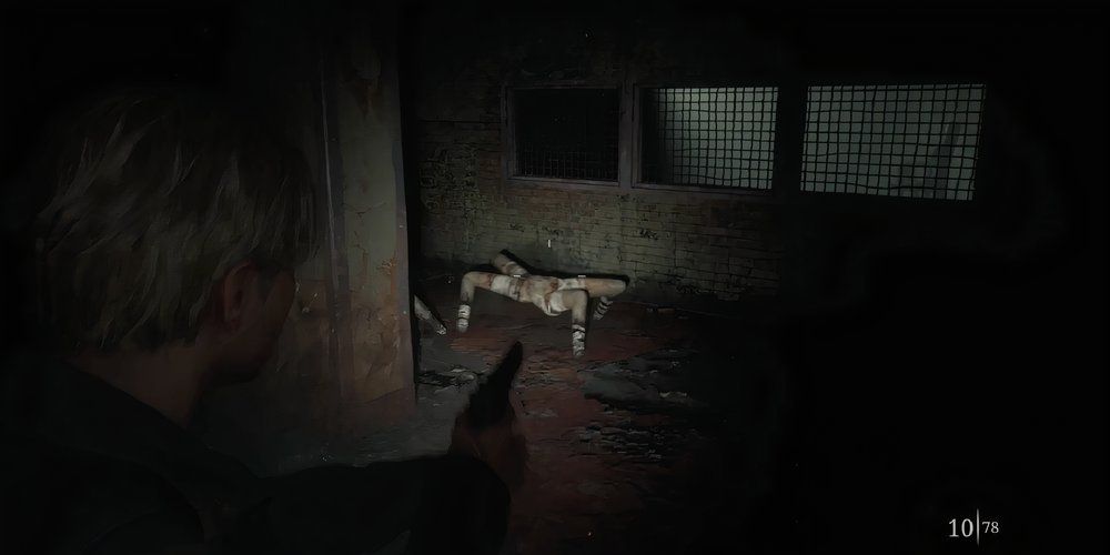 Silent Hill 2 remake Prison aiming at crawling mannequin