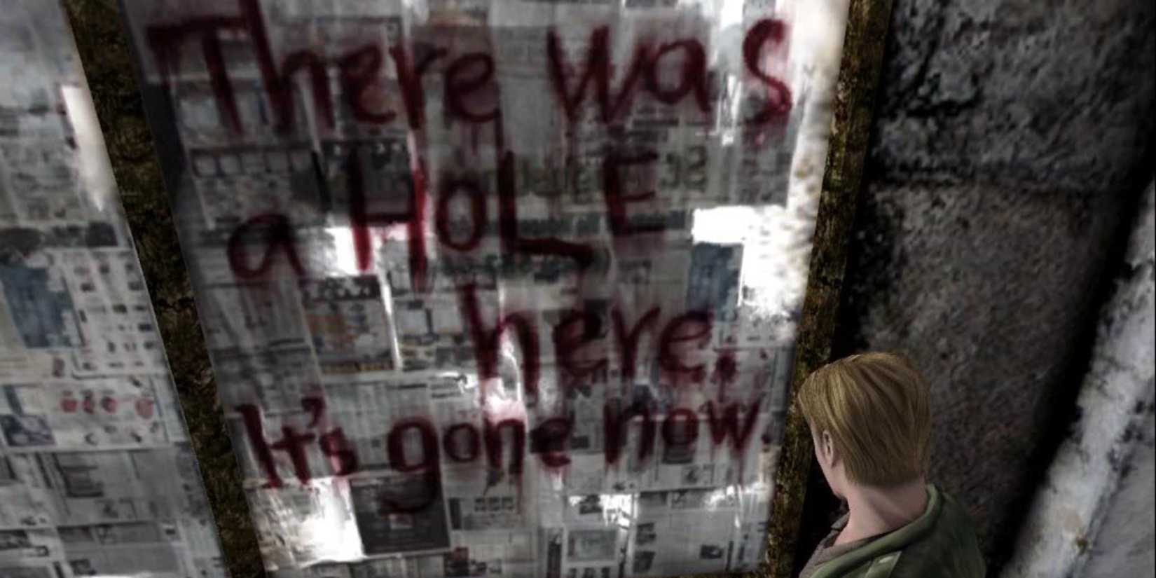 Silent Hill 2 - James looking at the window with a message scrawled on it