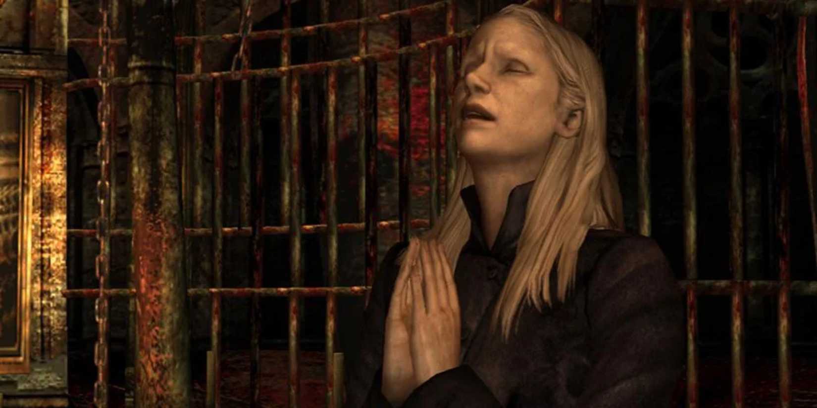 Claudia Wolf holding her hands together in prayer with her eyes closed