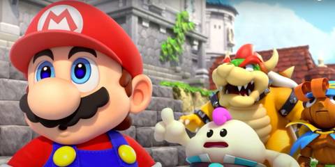 Mario standing next to Bowser, Geno, and Mallow looking concerned in Super Mario RPG