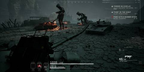 The player crouching with two female mechs moving around a campfire