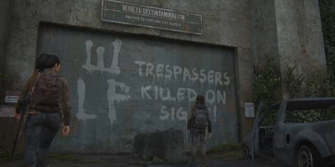 WLF gate with graffiti found by Ellie and Dina 