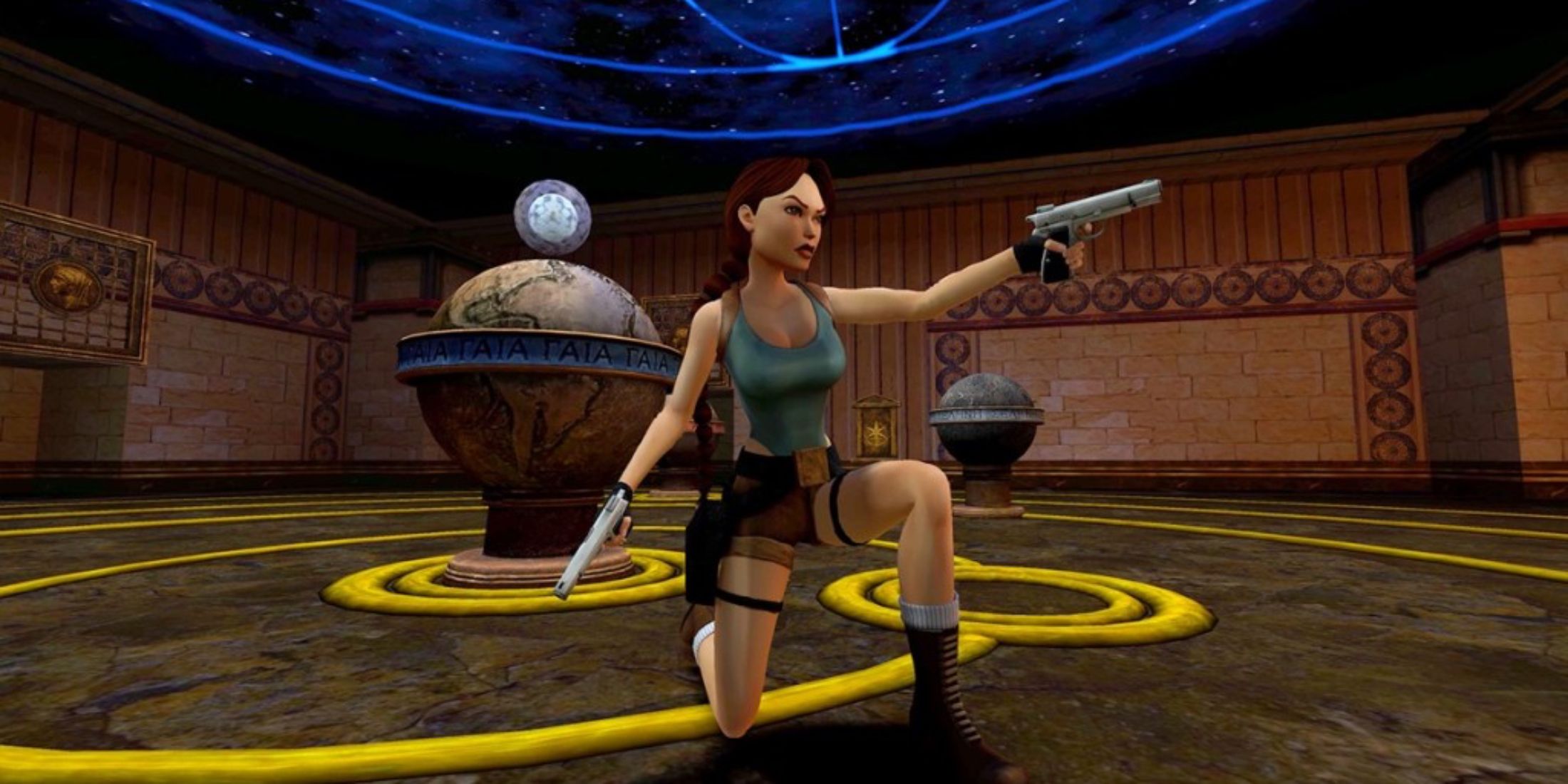 Lara Croft kneeling and wielding her dual pistols