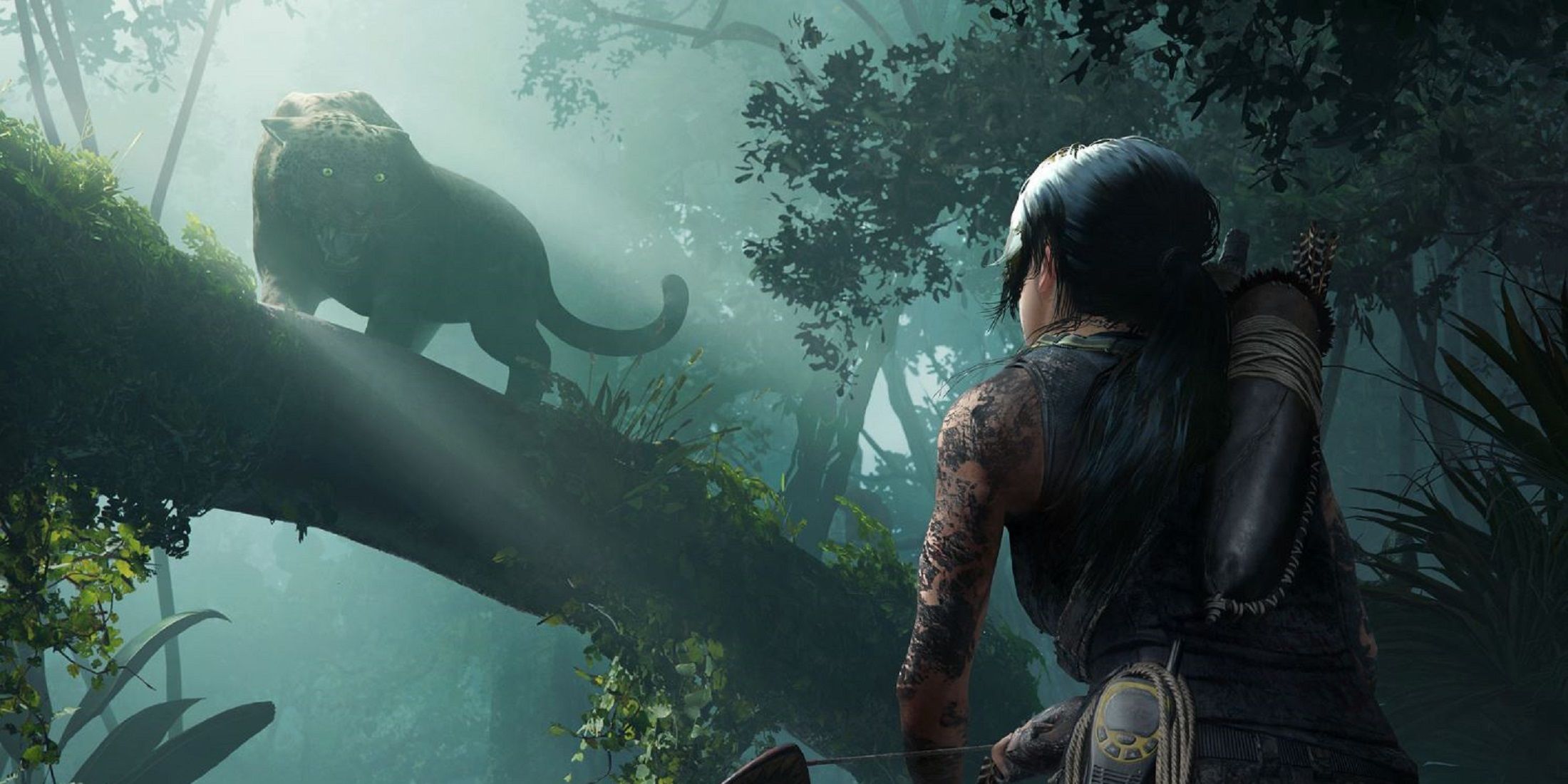 Lara Croft faces off against a growling jaguar in Shadow of the Tomb Raider