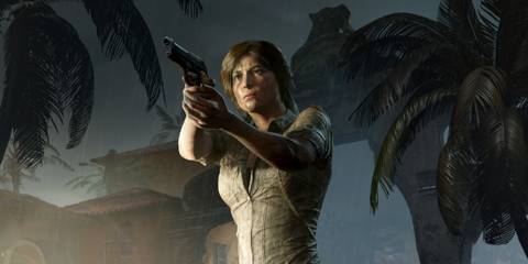 Lara Croft, from Shadow of the Tomb Raider, stands while aiming a handgun