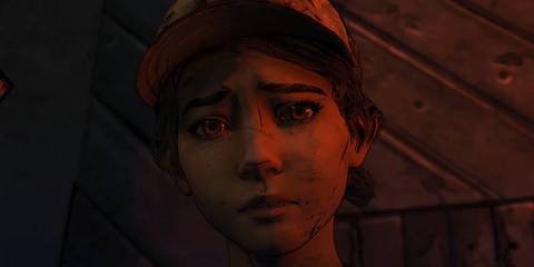 clementine looking sad with her face illuminated