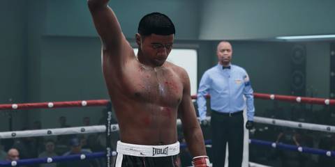 Undisputed Floyd Patterson raises his hand in victory