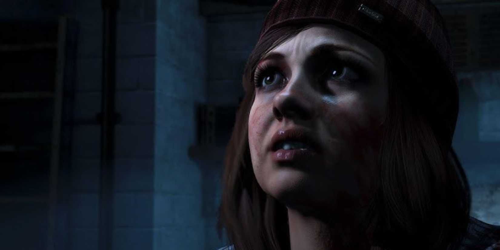 A close-up of Ashley looking worried in Until Dawn