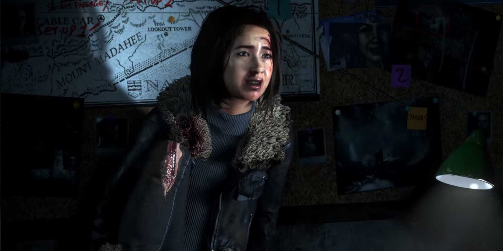 Emily sat on a counter in front of an evidence wall with her leg ripped open in Until Dawn