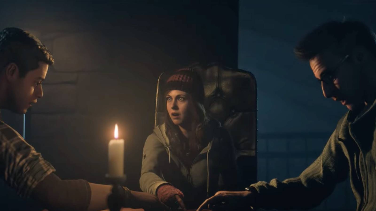 Ashley, Josh, and Chris performing a seance in the lodge in Until Dawn