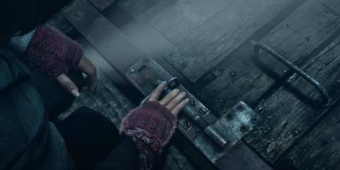 Ashley opening the trap door in Until Dawn