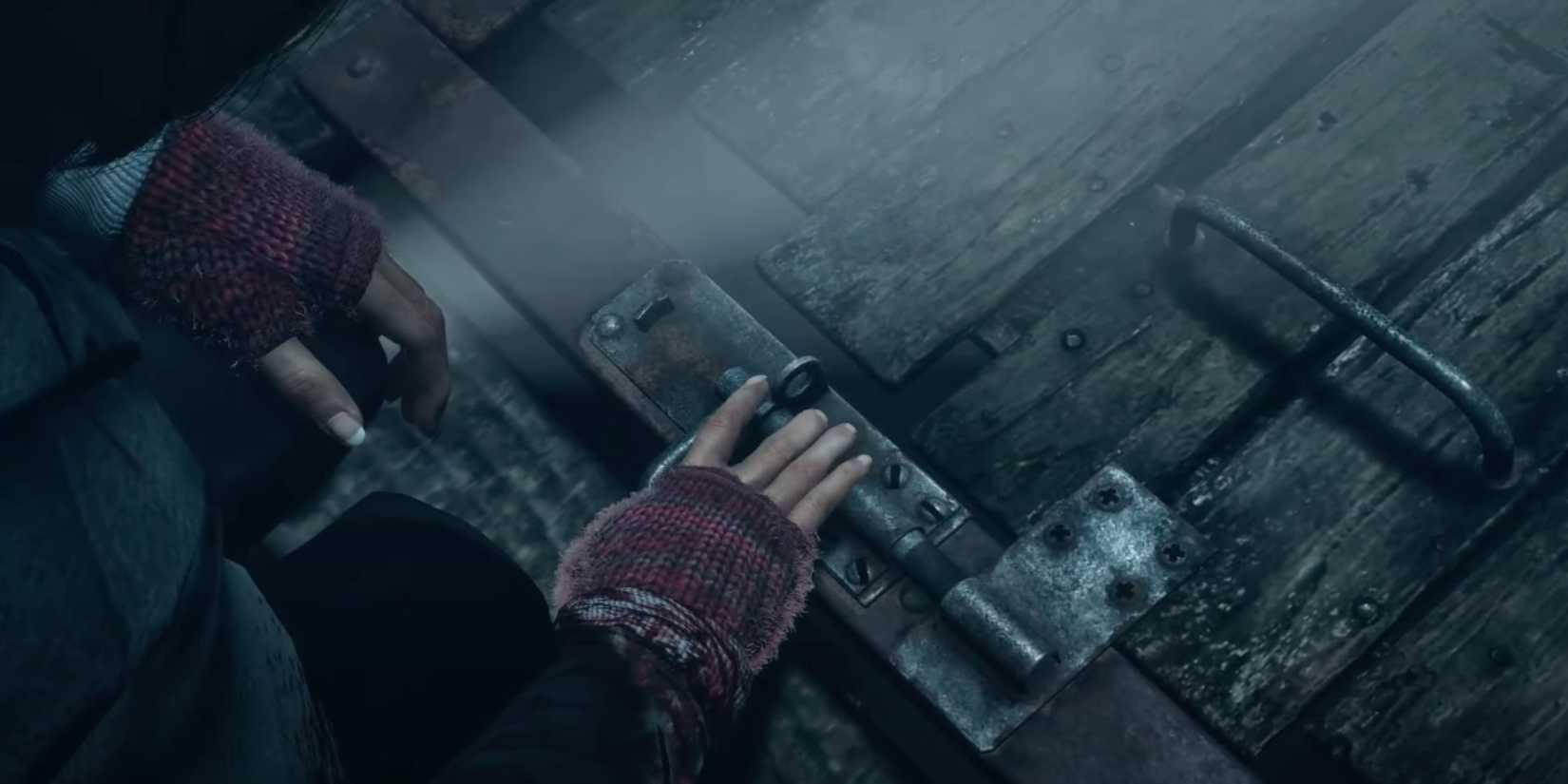 Ashley opening the trap door in Until Dawn