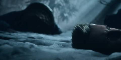 Chris' headless body in the snow in Until Dawn