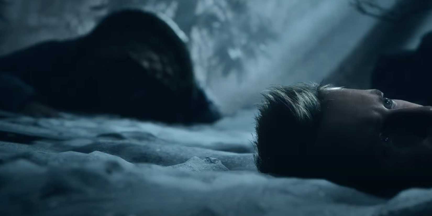 Chris' headless body in the snow in Until Dawn