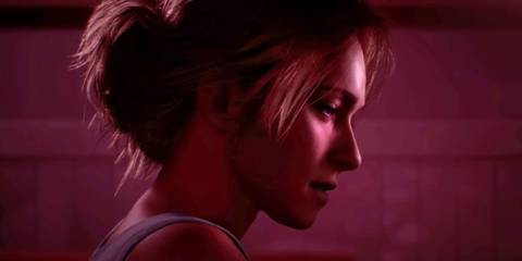 Until Dawn - Samantha Giddings staring off to the right with a red tint on the screen