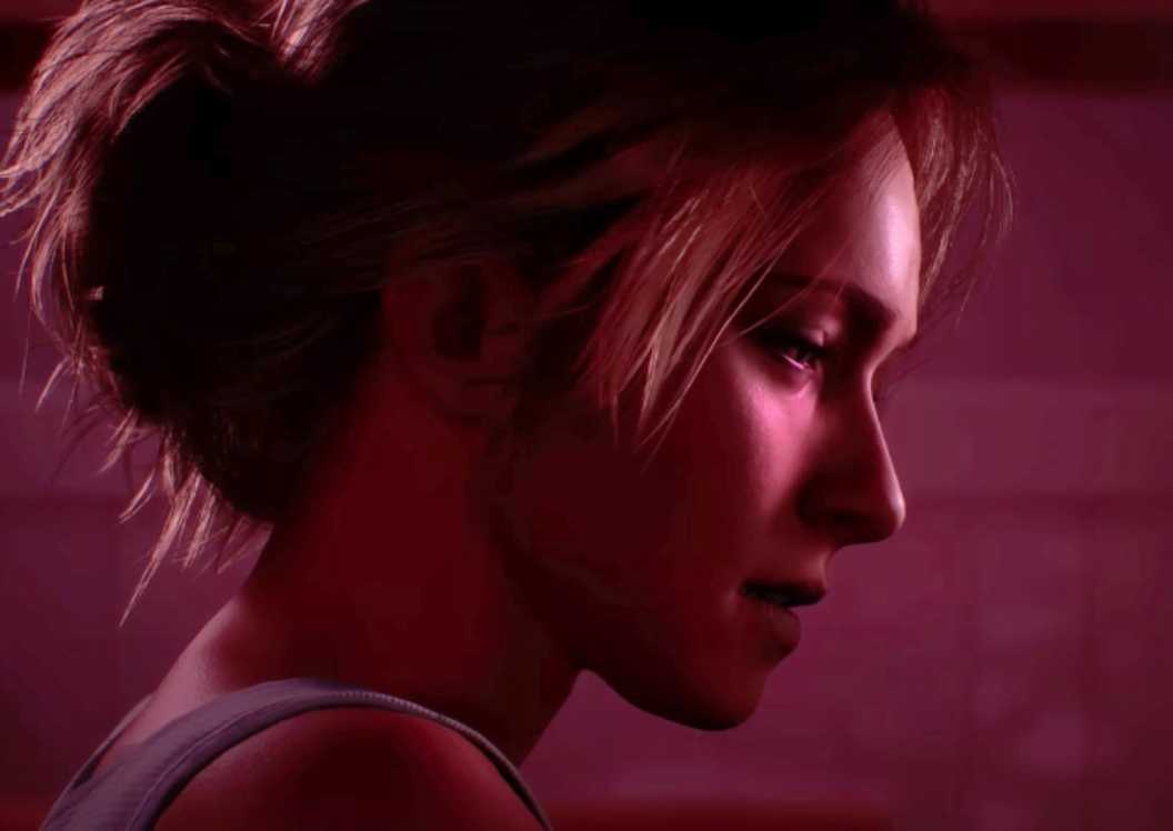 Until Dawn - Samantha Giddings staring off to the right with a red tint on the screen