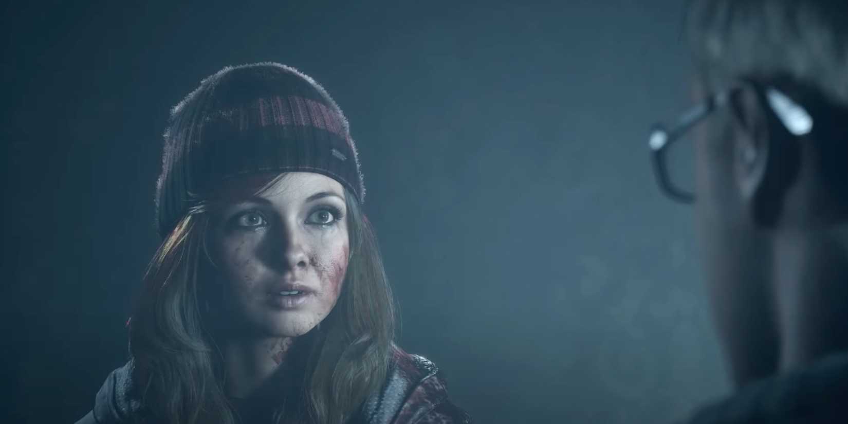 Ashley speaking to Chris in the lodge basement