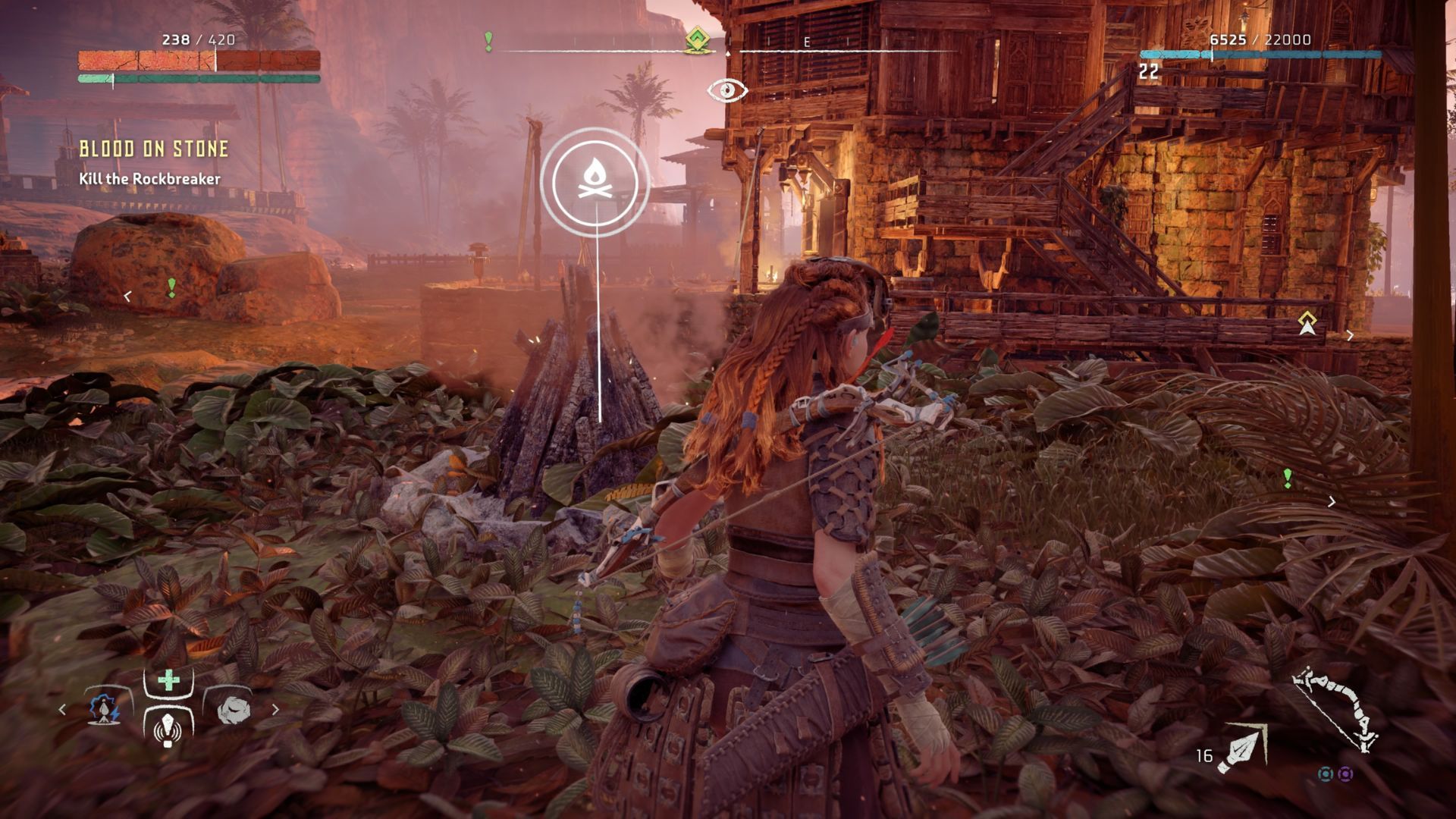 Aloy standing by a Campfire in Horizon: Zero Dawn