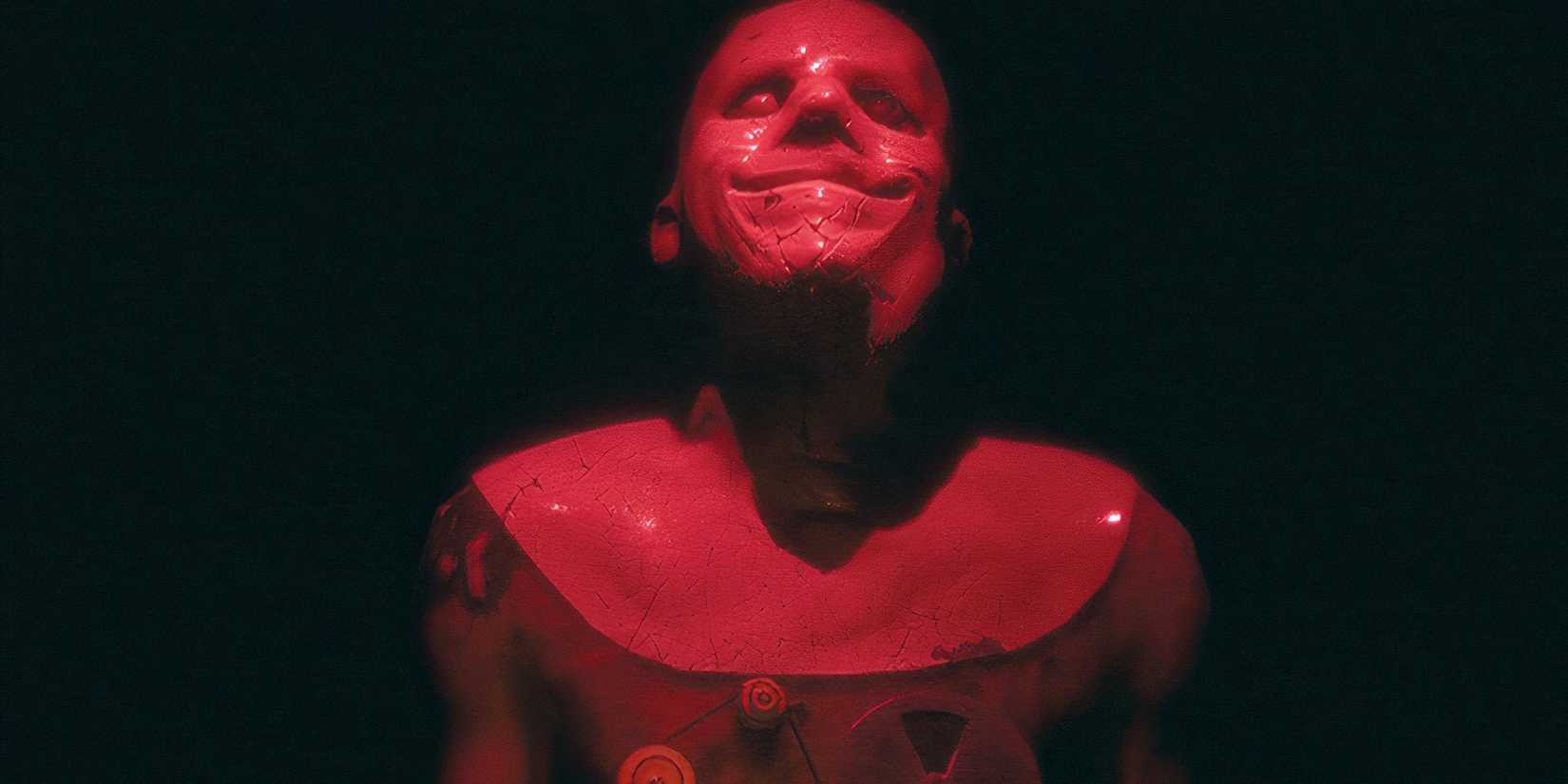 Weird entity on the cover of FLATHEAD game looking into the sky.