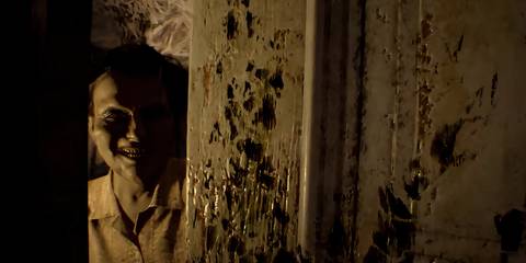 marguierite baker looking through a cracked door