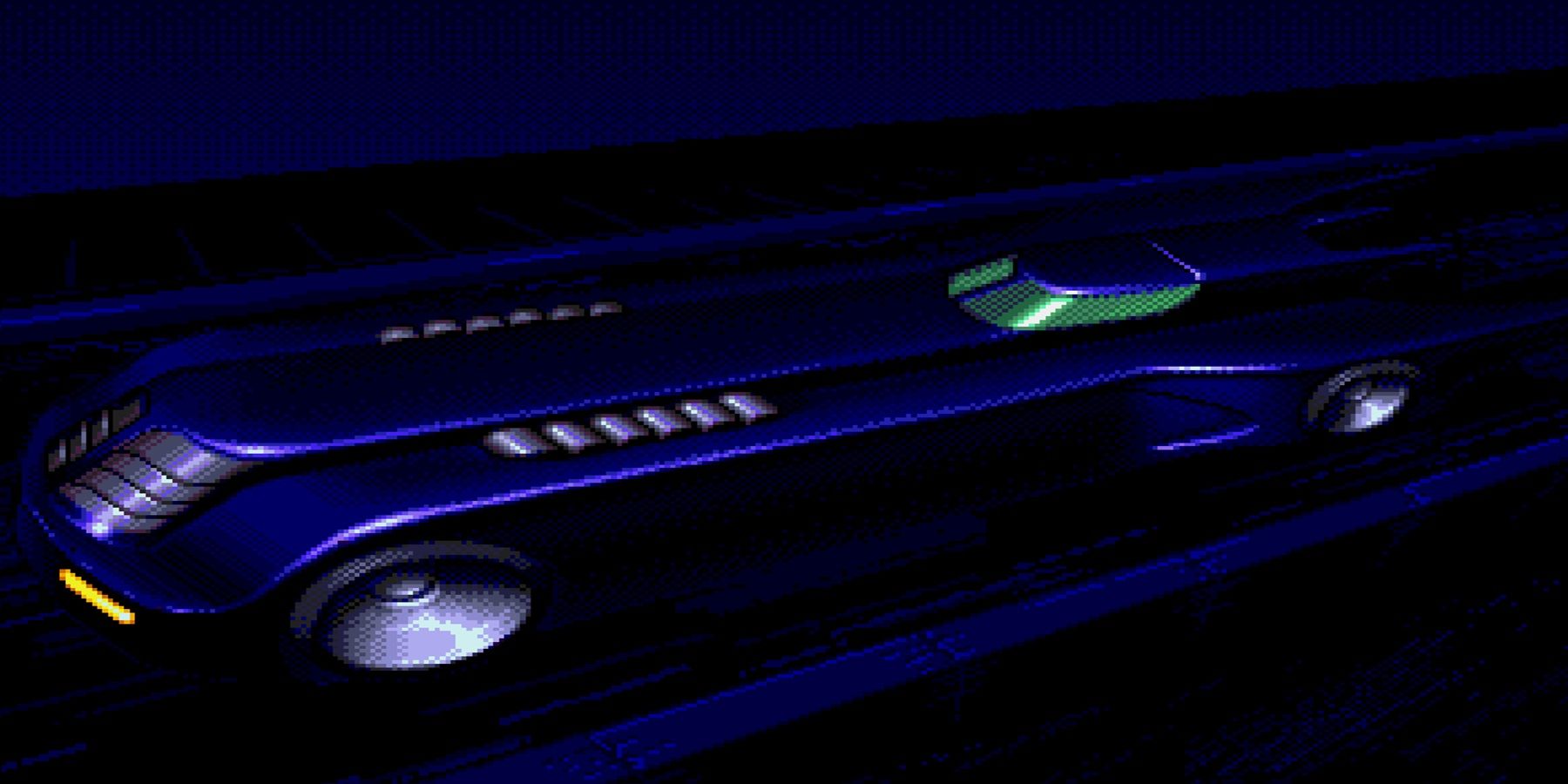 the batmobile driving down a street