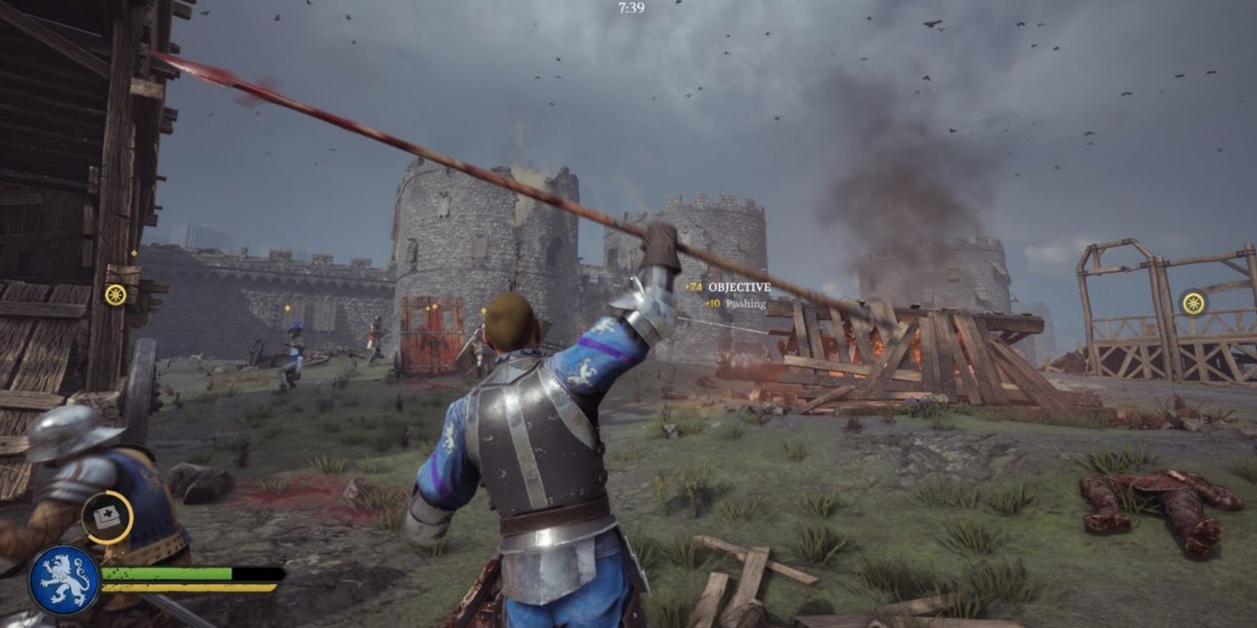 Chivalry 2 players sieging a castle