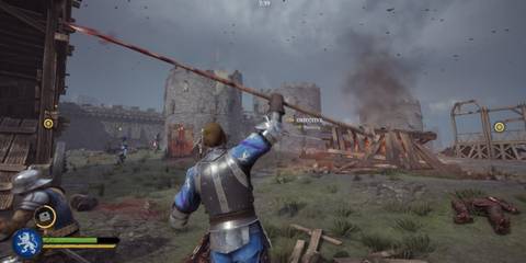 Chivalry 2 players sieging a castle