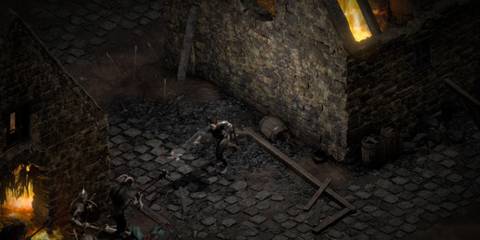 Battle scene in a medieval stone village in Diablo 2: Resurrected