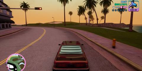 Driving in Grand Theft Auto: Vice City.