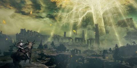 The Tarnished looking over a cliff at the Erdtree in Elden Ring