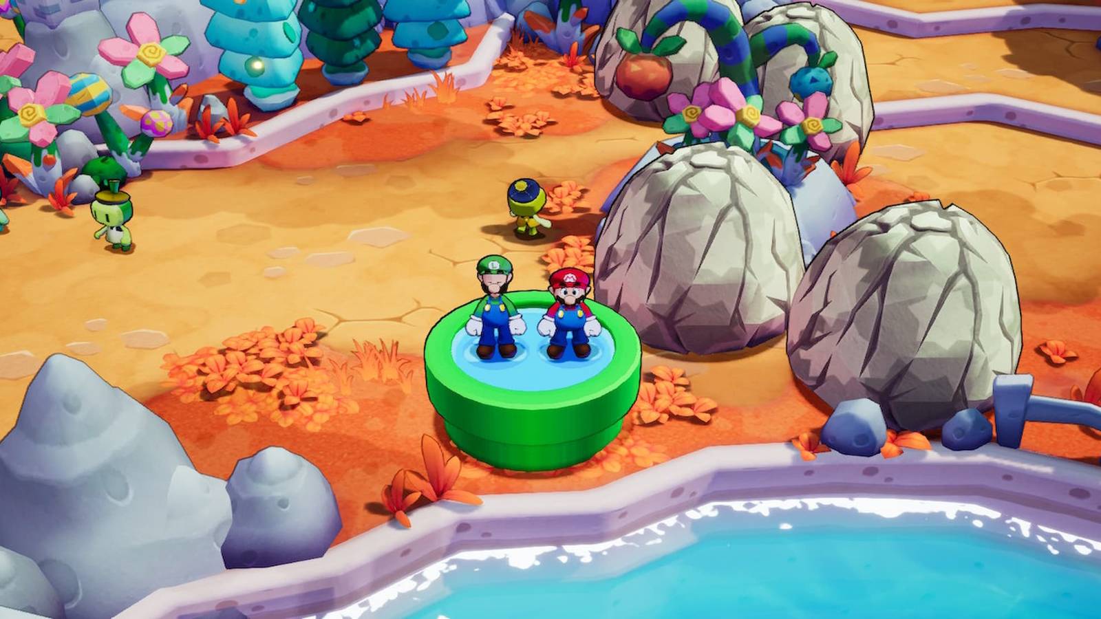Mario and Luigi Standing On A Green Pipe