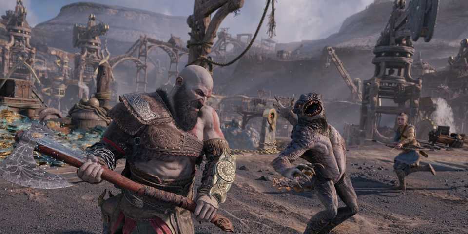 Kratos battling a creature with Atreus assisting in the background