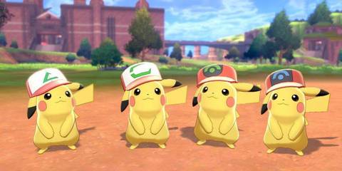 Screenshot of four Pikachu in Pokemon Sword and Shield wearing various hats owned by Ash Ketchum in the Pokemon anime