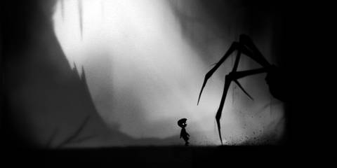 A young boy facing a giant spider