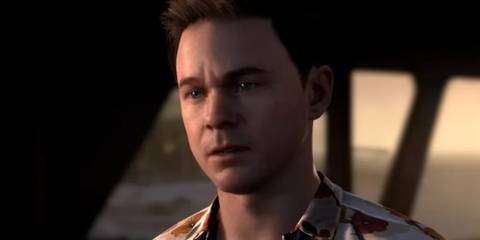 A close-up of Conrad in a Hawaiian shirt in Man of Medan