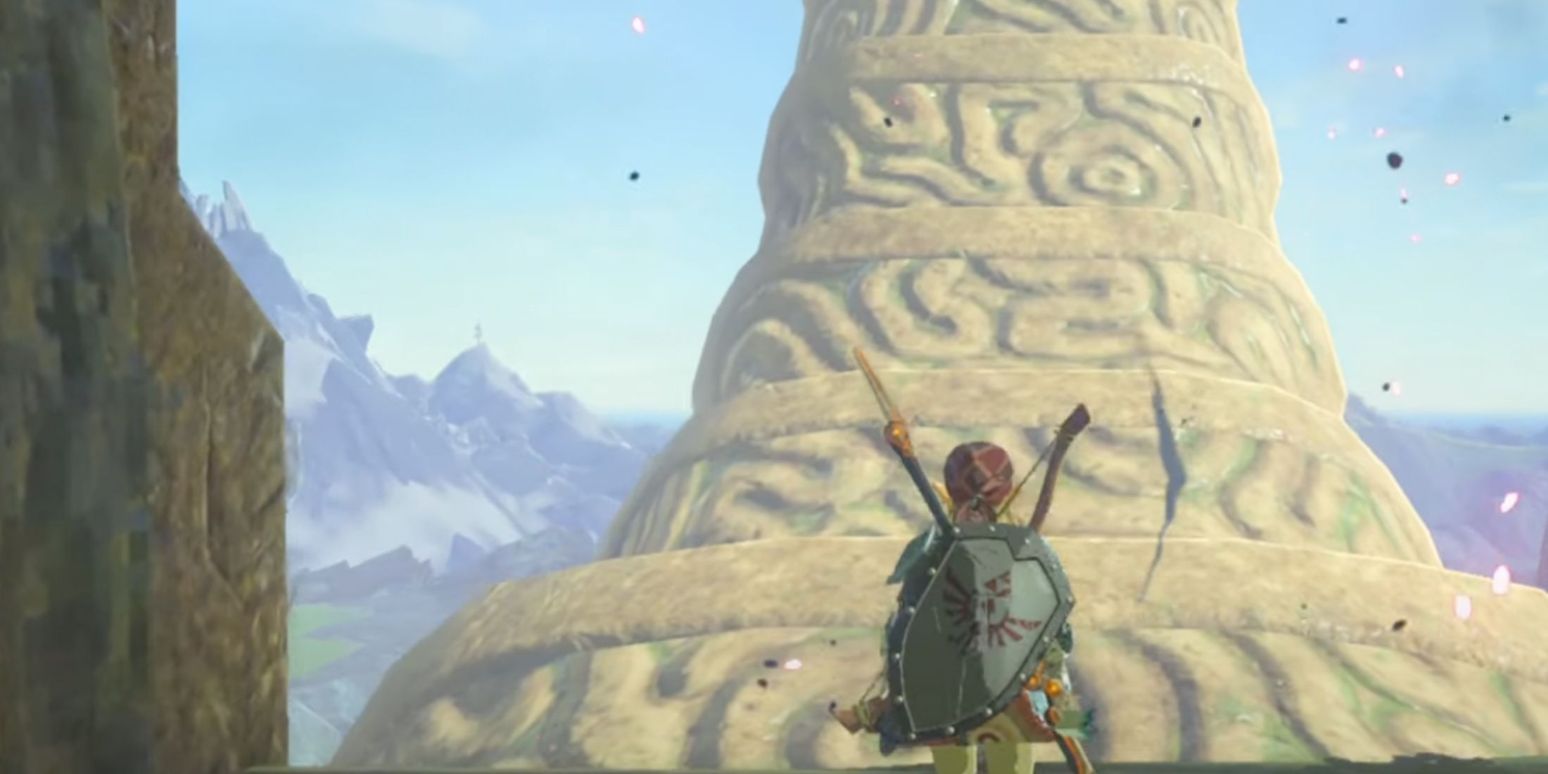 Link standing before a great swirling structure