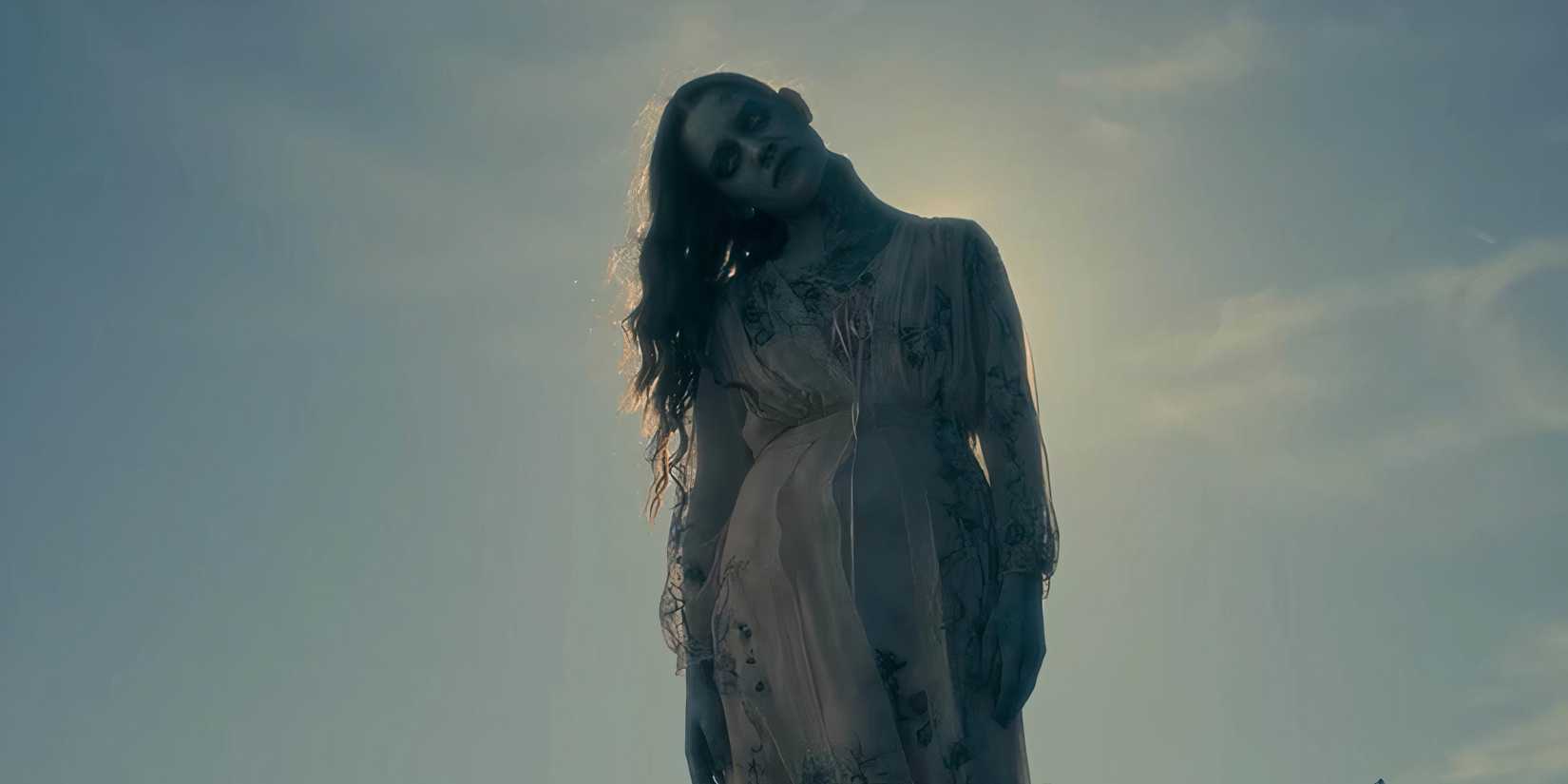 10 Best Horror TV Shows of All Time a ghostly woman stands in front of a grave